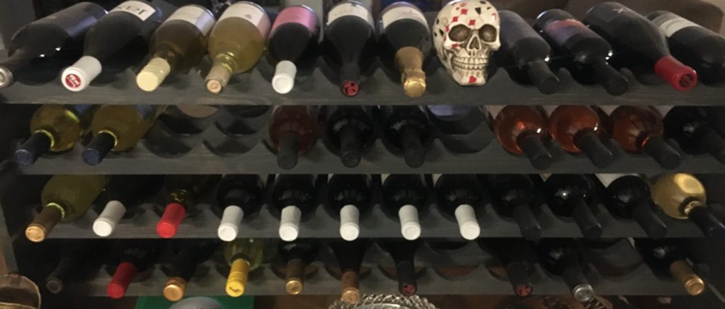 My wine collection at my house of all of our fine wines I miss them I drank them all amazing